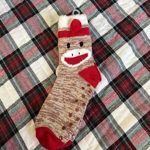 The sock monkey has rubber on the bottom for slip resistant.-Copy